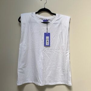 NWT white tee with shoulder pads and back cut out